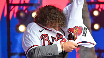 Jul 17, 2022; Los Angeles, CA, USA;  JR Ritchie puts on his jersey after he was selected by the Atlanta Braves as the 35th pick of the MLB draft at XBox Plaza at LA Live. Mandatory Credit: Jayne Kamin-Oncea-Imagn Images