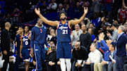 Dec 20, 2023; Philadelphia, Pennsylvania, USA; Philadelphia 76ers center Joel Embiid (21) reacts with fans after leaving the game in the closing seconds of a victory against the Minnesota Timberwolves at Wells Fargo Center. Mandatory Credit: Bill Streicher-Imagn Images