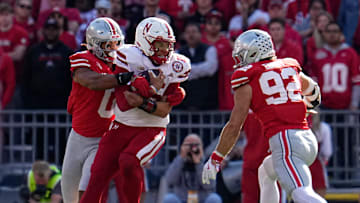 Ohio State Buckeyes linebacker Cody Simon (0) tackles Nebraska Cornhuskers quarterback Dylan Raiola (15) during the second half of the NCAA football game at Ohio Stadium in Columbus on Saturday, Oct. 26, 2024. Ohio State won 21-17.