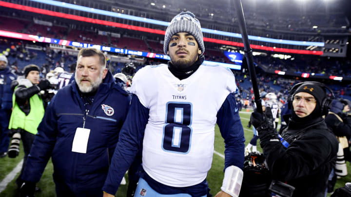 Tennessee Titans quarterback Marcus Mariota (8) walks off the field after their 35-14 loss to the New England Patriots in the AFC Divisional Round playoff game at Gillette Stadium in Foxborough, Mass., Jan. 13, 2018.