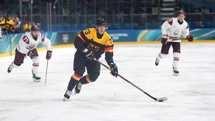 Feb 14, 2026; Milan, Italy; Lukas Reichel of Germany in action during a Group C men's ice hockey game during the Milano Cortina 2026 Olympic Winter Games at Milano Rho Ice Hockey Arena. Mandatory Credit: Amber Searls-Imagn Images