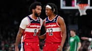 Nov 5, 2025; Boston, Massachusetts, USA; Washington Wizards guard Tre Johnson (12) talks with guard/forward Justin Champagnie (9) as they take on the Boston Celtics in the second half at TD Garden. Mandatory Credit: David Butler II-Imagn Images