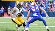 Oct 9, 2022; Orchard Park, New York, USA; Pittsburgh Steelers wide receiver Chase Claypool (11) runs with the ball against Buffalo Bills linebacker Baylon Spector (54) after a catch in the fourth quarter at Highmark Stadium. Mandatory Credit: Mark Konezny-USA TODAY Sports