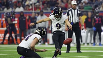 Baltimore Ravens place kicker Justin Tucker makes an extra point against the Houston Texans in the first quarter at NRG Stadium. 