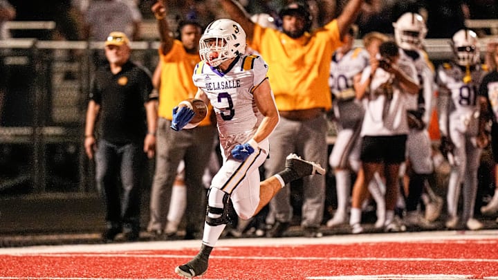 Warren De La Salle running back Mike Lopez runs for a touchdown against Orchard Lake St. Mary's during the second half at Orchard Lake St. Mary's in West Bloomfield Township on Friday, September 13, 2024.
