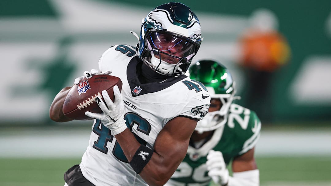 Aug 22, 2025; East Rutherford, New Jersey, USA; Former Philadelphia Eagles wide receiver Terrace Marshall Jr. (46) gains yards after catch during the first half against the New York Jets at MetLife Stadium.