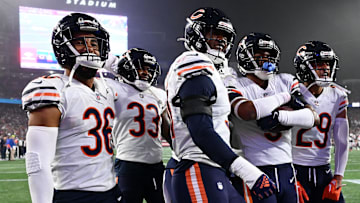 Oct 24, 2022; Foxborough, Massachusetts, USA; Chicago Bears safety DeAndre Houston-Carson (36), cornerback Jaylon Johnson (33), defensive end Dominique Robinson (91), safety Jaquan Brisker (9), and cornerback Dane Cruikshank (29) celebrate after an interception against the New England Patriots during the first half at Gillette Stadium. Mandatory Credit: Brian Fluharty-Imagn Images
