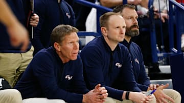 Gonzaga head coach Mark Few (left) with staff members Stephen Gentry (middle) and Josh Therrien (right).