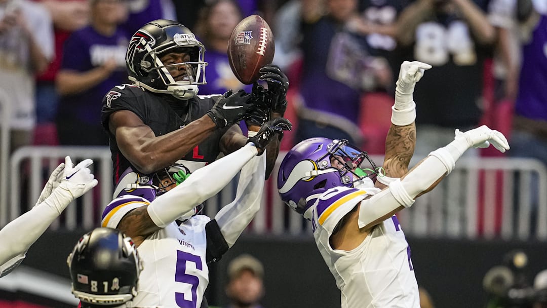 Nov 5, 2023; Atlanta, Georgia, USA; Atlanta Falcons wide receiver Van Jefferson (15) tries to make a catch over Minnesota Vikings cornerbacks Mekhi Blackmon (5) and  Byron Murphy Jr. (7) on the final play of the game  during the second half at Mercedes-Benz Stadium. Mandatory Credit: Dale Zanine-Imagn Images
