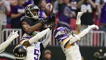 Nov 5, 2023; Atlanta, Georgia, USA; Atlanta Falcons wide receiver Van Jefferson (15) tries to make a catch over Minnesota Vikings cornerbacks Mekhi Blackmon (5) and  Byron Murphy Jr. (7) on the final play of the game  during the second half at Mercedes-Benz Stadium. Mandatory Credit: Dale Zanine-Imagn Images