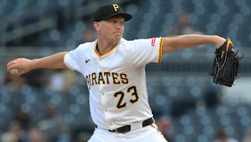 May 19, 2025; Pittsburgh, Pennsylvania, USA;  Pittsburgh Pirates starting pitcher Mitch Keller (23) delivers a pitch against the Cincinnati Reds during the first inning at PNC Park. Mandatory Credit: Charles LeClaire-Imagn Images