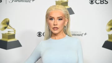 Christina Aguilera poses in the press room during the 66th GRAMMY Awards