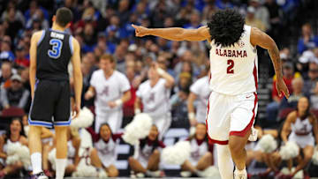 Mar 27, 2025; Newark, NJ, USA; Alabama Crimson Tide guard Aden Holloway (2) celebrates making a three pointer during the second half against the Brigham Young Cougars during an East Regional semifinal of the 2025 NCAA tournament at Prudential Center. Mandatory Credit: Robert Deutsch-Imagn Images