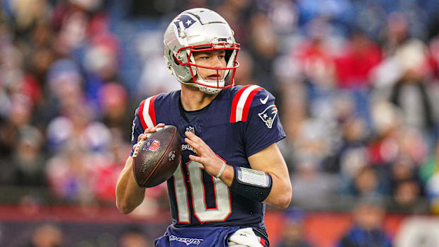 New England Patriots quarterback Drake Maye (10) looks to pass the ball during a game against the Los Angeles Chargers.