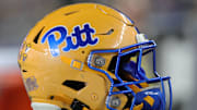 Nov 9, 2024; Pittsburgh, Pennsylvania, USA;  A Pittsburgh Panthers helmet on the sidelines against the Virginia Cavaliers during the first quarter at Acrisure Stadium. Mandatory Credit: Charles LeClaire-Imagn Images