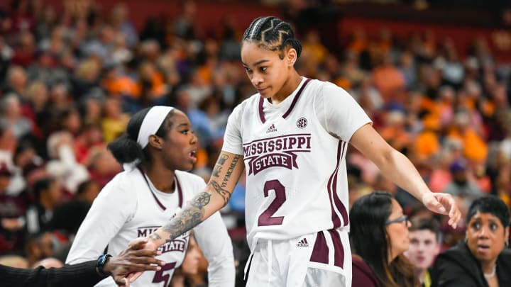 Mississippi State guard Jerkaila Jordan (2) high-fives teammates as she comes off the court during the third quarter of the SEC Women's Basketball Tournament game three at the Bon Secours Wellness Arena in Greenville, S.C. Thursday, March 7, 2024.