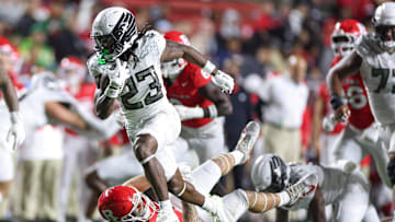 Dierre Hill continued his fabulous freshman season with a 35-yard touchdown run against Rutgers. The Ducks ran for 415 yards in a 56-10 road victory.
