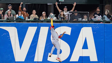 Sep 24, 2025; San Francisco, California, USA; St. Louis Cardinals center fielder Victor Scott II (11) fields a fly ball against the San Francisco Giants during the sixth inning at Oracle Park. Mandatory Credit: Neville E. Guard-Imagn Images