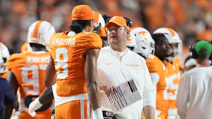 Tennessee head coach Josh Heupel and Tennessee quarterback Nico Iamaleava (8) chat on the sidelines during a game between Tennessee and Kent State at Neyland Stadium, in Knoxville, Tenn., Saturday, Sept. 14, 2024.