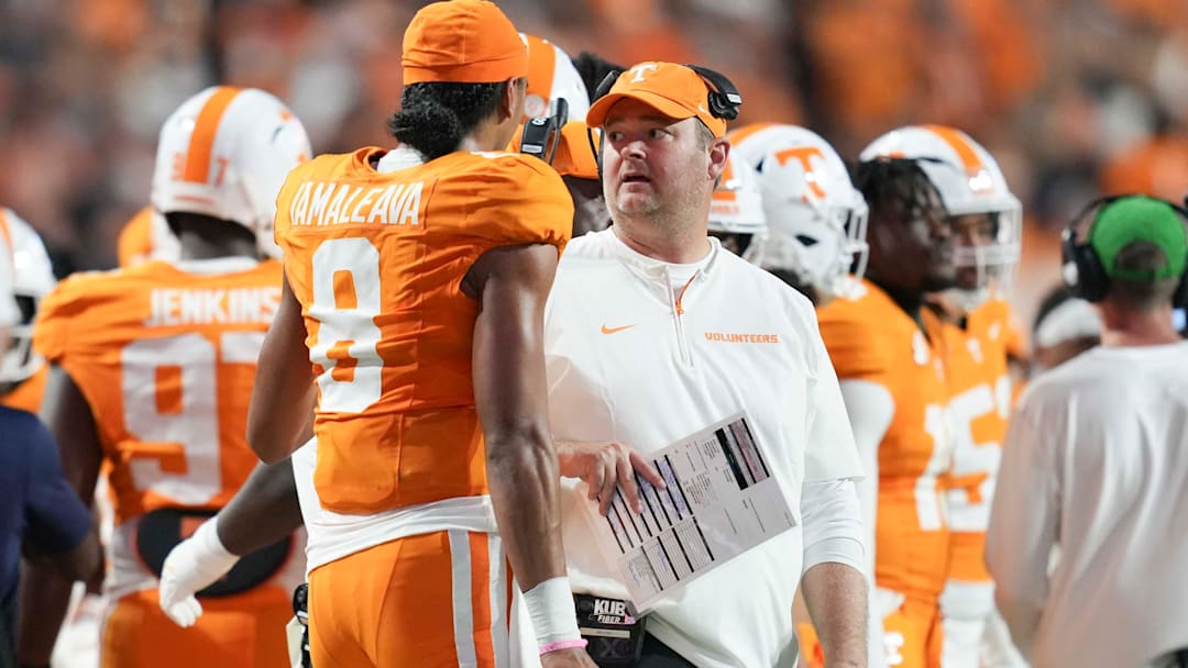 Tennessee head coach Josh Heupel and Tennessee quarterback Nico Iamaleava (8) chat on the sidelines during a game between Tennessee and Kent State at Neyland Stadium, in Knoxville, Tenn., Saturday, Sept. 14, 2024.