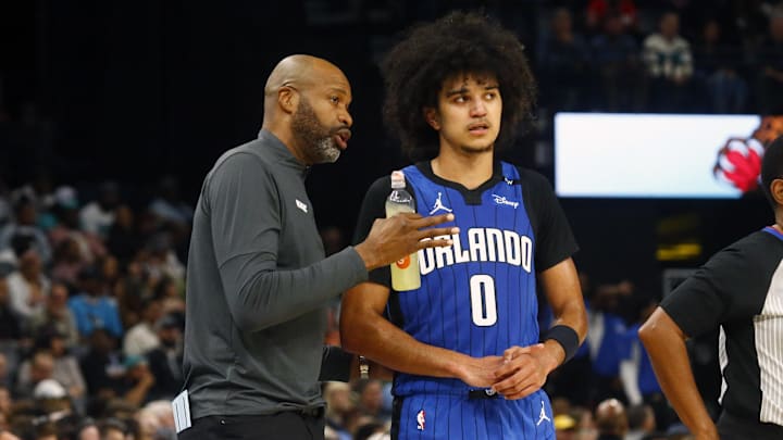 Orlando Magic head coach Jamahl Mosley talks with guard Anthony Black (0) during the first half against the Memphis Grizzlies at FedExForum. Orlando Magic head coach Jamahl Mosley talks with guard Anthony Black (0) during the first half against the Memphis Grizzlies at FedExForum.