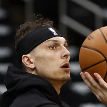 May 1, 2024; Boston, Massachusetts, USA; Miami Heat guard Tyler Herro (14) warms up prior to their game against the Boston Celtics in game five of the first round of the 2024 NBA playoffs at TD Garden. Mandatory Credit: Winslow Townson-USA TODAY Sports