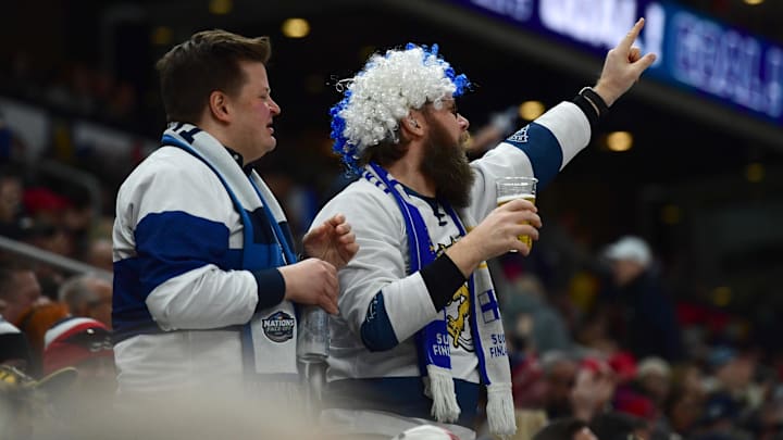 Feb 17, 2025; Boston, MA, USA; [Imagn Images direct customers only]  Team Finland fans cheer after a goal during the third period in a 4 Nations Face-Off ice hockey game against Team Canada at TD Garden. Mandatory Credit: Bob DeChiara-Imagn Images