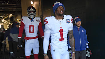 Jan 5, 2025; Philadelphia, Pennsylvania, USA; New York Giants wide receiver Malik Nabers (1) and linebacker Brian Burns (0) take the field against the Philadelphia Eagles at Lincoln Financial Field. Mandatory Credit: Eric Hartline-Imagn Images