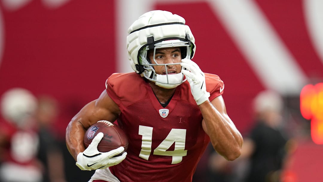 Arizona Cardinals receiver Michael Wilson (14) runs with the ball during training camp at State Farm Stadium on Aug 6, 2024, in Glendale, Ariz.