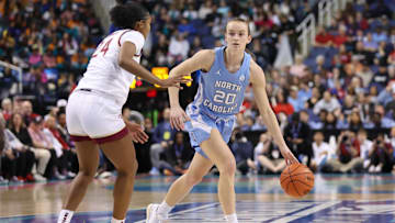 Mar 7, 2025; Greensboro, NC, USA;  North Carolina Tar Heels guard Lexi Donarski (20) sets the play during the second quarter at First Horizon Coliseum. Mandatory Credit: Cory Knowlton-Imagn Images