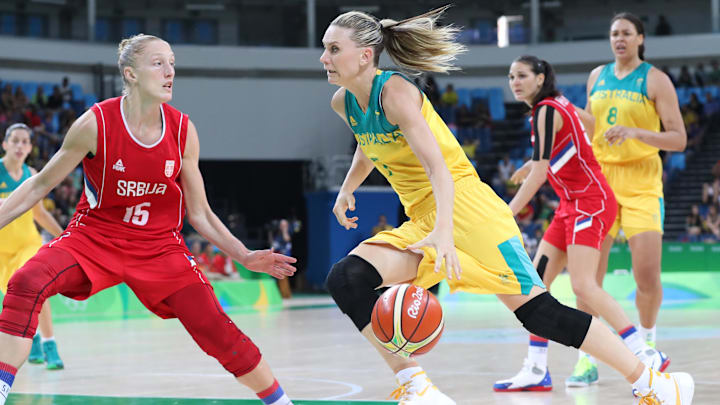 Aug 16, 2016; Rio de Janeiro, Brazil; Australia shooting guard Penny Taylor (7) drives against Serbia power forward Danielle Page (15) in a women's quarterfinal basketball game at Carioca Arena 1 during the Rio 2016 Summer Olympic Games. Mandatory Credit: Geoff Burke-Imagn Images