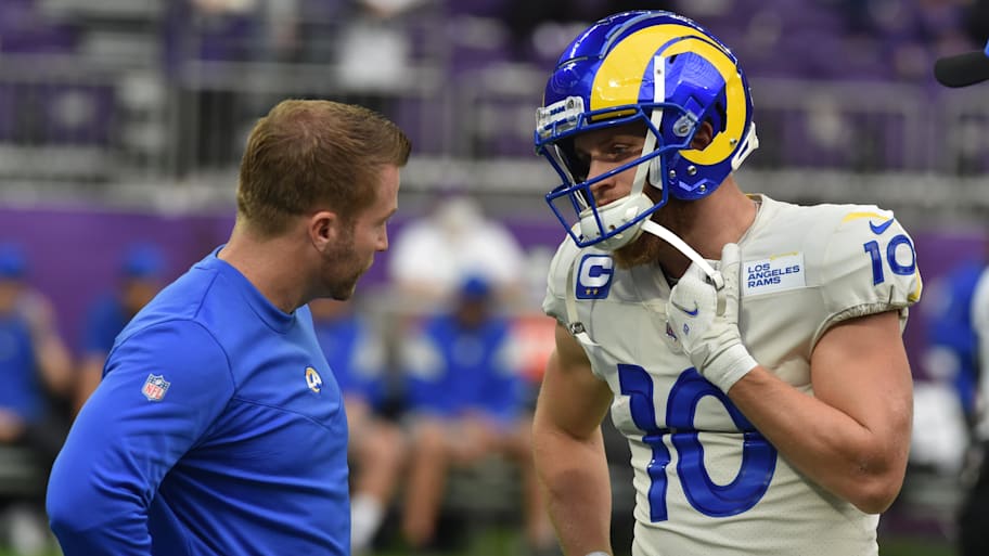 Dec 26, 2021; Minneapolis, Minnesota, USA; Los Angeles Rams head coach Sean McVay talks with wide receiver Cooper Kupp (10) before the game against the Minnesota Vikings at U.S. Bank Stadium. Mandatory Credit: Jeffrey Becker-Imagn Images | Jeffrey Becker-Imagn Images