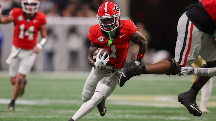 Nov 28, 2025; Atlanta, Georgia, USA; Georgia Bulldogs wide receiver Zachariah Branch (1) runs after a catch against the Georgia Tech Yellow Jackets in the second quarter at Mercedes-Benz Stadium. Mandatory Credit: Brett Davis-Imagn Images