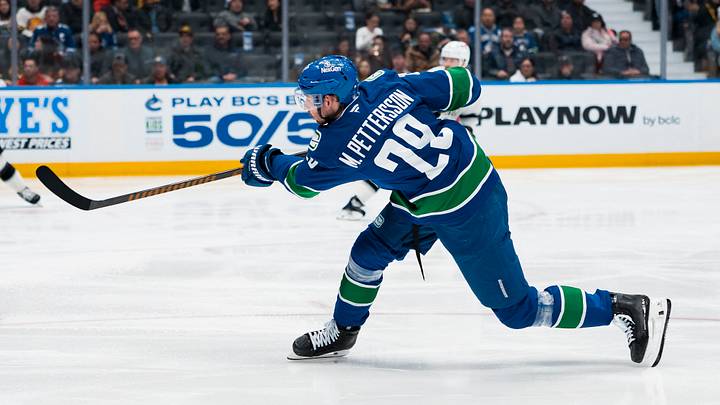 Mar 26, 2026; Vancouver, British Columbia, CAN; Vancouver Canucks defenseman Marcus Pettersson (29) shoots against the Los Angeles Kings in the second period at Rogers Arena. Mar 26, 2026; Vancouver, British Columbia, CAN; Vancouver Canucks defenseman Marcus Pettersson (29) shoots against the Los Angeles Kings in the second period at Rogers Arena.