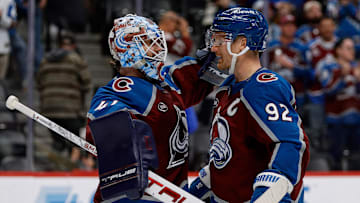 Nov 11, 2025; Denver, Colorado, USA; Colorado Avalanche goaltender Scott Wedgewood (41) celebrates with left wing Gabriel Landeskog (92) after the game against the Anaheim Ducks at Ball Arena. Mandatory Credit: Isaiah J. Downing-Imagn Images