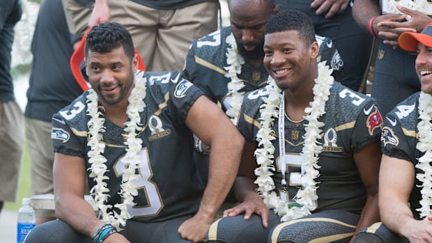 Russell Wilson (left), Jameis Winston