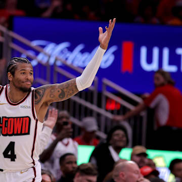 Apr 4, 2025; Houston, Texas, USA; Houston Rockets guard Jalen Green (4) reacts after a made basket against the Oklahoma City Thunder during the fourth quarter at Toyota Center. Mandatory Credit: Erik Williams-Imagn Images