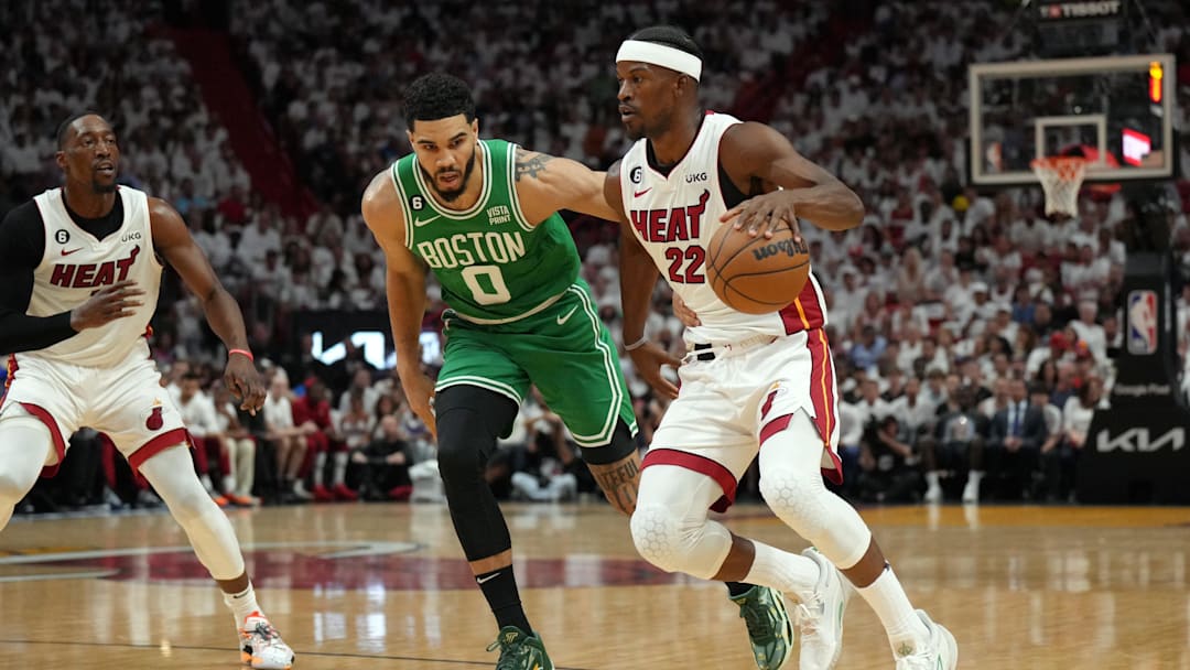 May 23, 2023; Miami, Florida, USA; Miami Heat forward Jimmy Butler (22) controls the ball against Boston Celtics forward Jayson Tatum (0) in the first quarter during game four of the Eastern Conference Finals for the 2023 NBA playoffs at Kaseya Center. Mandatory Credit: Jim Rassol-Imagn Images May 23, 2023; Miami, Florida, USA; Miami Heat forward Jimmy Butler (22) controls the ball against Boston Celtics forward Jayson Tatum (0) in the first quarter during game four of the Eastern Conference Finals for the 2023 NBA playoffs at Kaseya Center. Mandatory Credit: Jim Rassol-Imagn Images