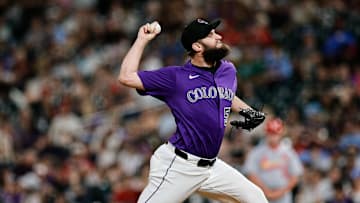 Jul 21, 2025; Denver, Colorado, USA; Colorado Rockies relief pitcher Jake Bird (59) pitches in the ninth inning against the St. Louis Cardinals at Coors Field. 