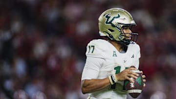 Sep 7, 2024; Tuscaloosa, Alabama, USA; South Florida Bulls quarterback Byrum Brown (17) looks for a pass against the Alabama Crimson Tide during the fourth quarter at Bryant-Denny Stadium. Mandatory Credit: William McLelland-Imagn Images