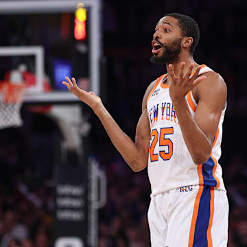 Mar 22, 2025; New York, New York, USA; New York Knicks forward Mikal Bridges (25) reacts after making a three point basket during the first half against the Washington Wizards at Madison Square Garden. Mandatory Credit: Vincent Carchietta-Imagn Images