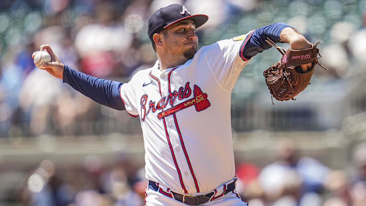 Aug 25, 2024; Cumberland, Georgia, USA; Atlanta Braves relief pitcher Luke Jackson (22) pitches against the Washington Nationals during the seventh inning at Truist Park. Mandatory Credit: Dale Zanine-Imagn Images