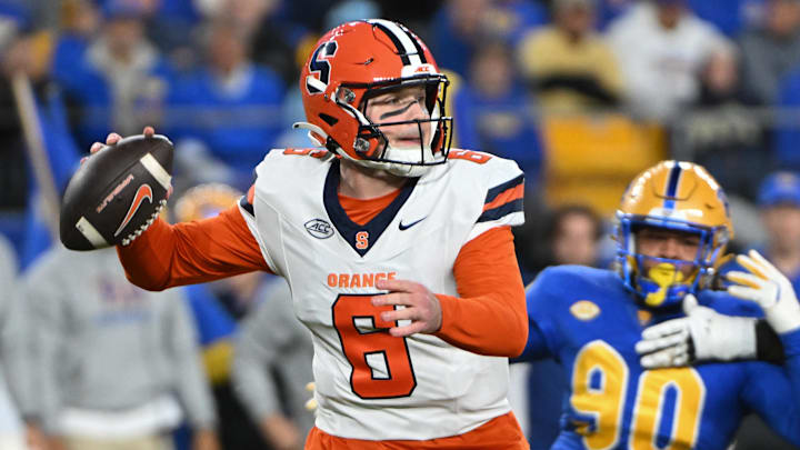 Syracuse quarterback Kyle McCord throws a pass during the first quarter against the Pittsburgh Panthers. Syracuse quarterback Kyle McCord throws a pass during the first quarter against the Pittsburgh Panthers.