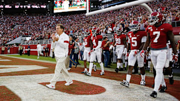 Coach Nick Saban leads the Crimson Tide onto the field before Alabama's homecoming game against Arkansas in Bryant-Denny Stadium Saturday, Oct. 26, 2019.
