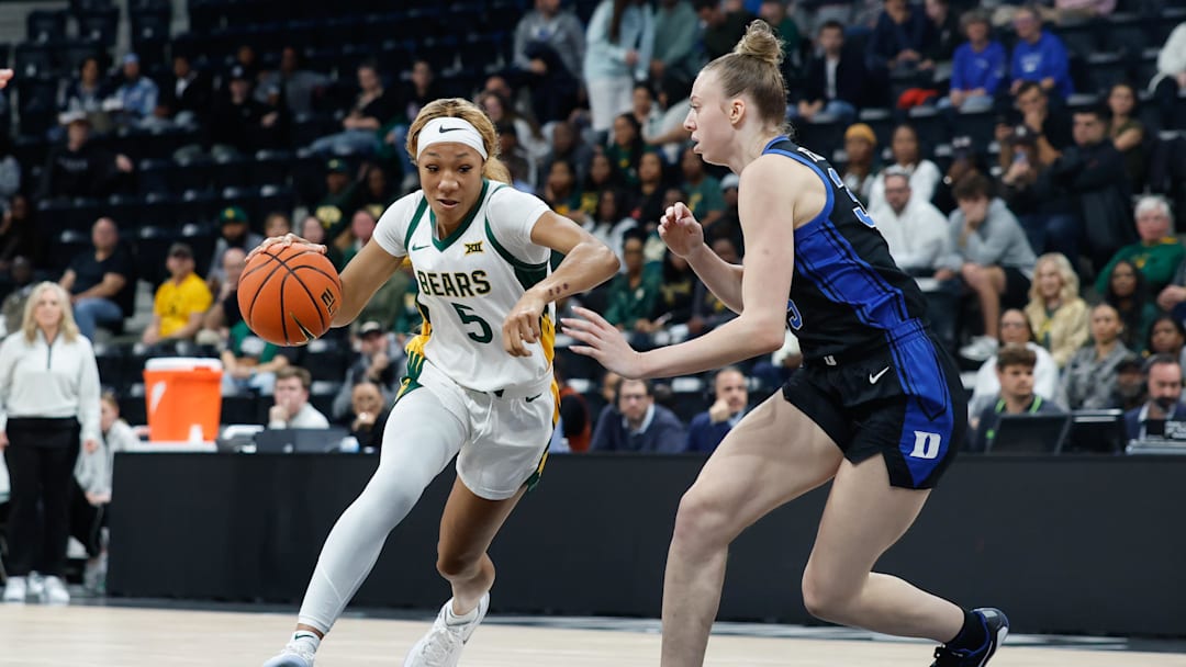 Nov 3, 2025; Paris, FRA;  Baylor Bears forward Darianna Littlepage-Buggs (5) drives to the basket against Duke Blue Devils forward Toby Fournier (35) during the first half at Adidas Arena.