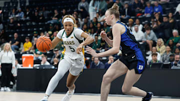 Nov 3, 2025; Paris, FRA;  Baylor Bears forward Darianna Littlepage-Buggs (5) drives to the basket against Duke Blue Devils forward Toby Fournier (35) during the first half at Adidas Arena.