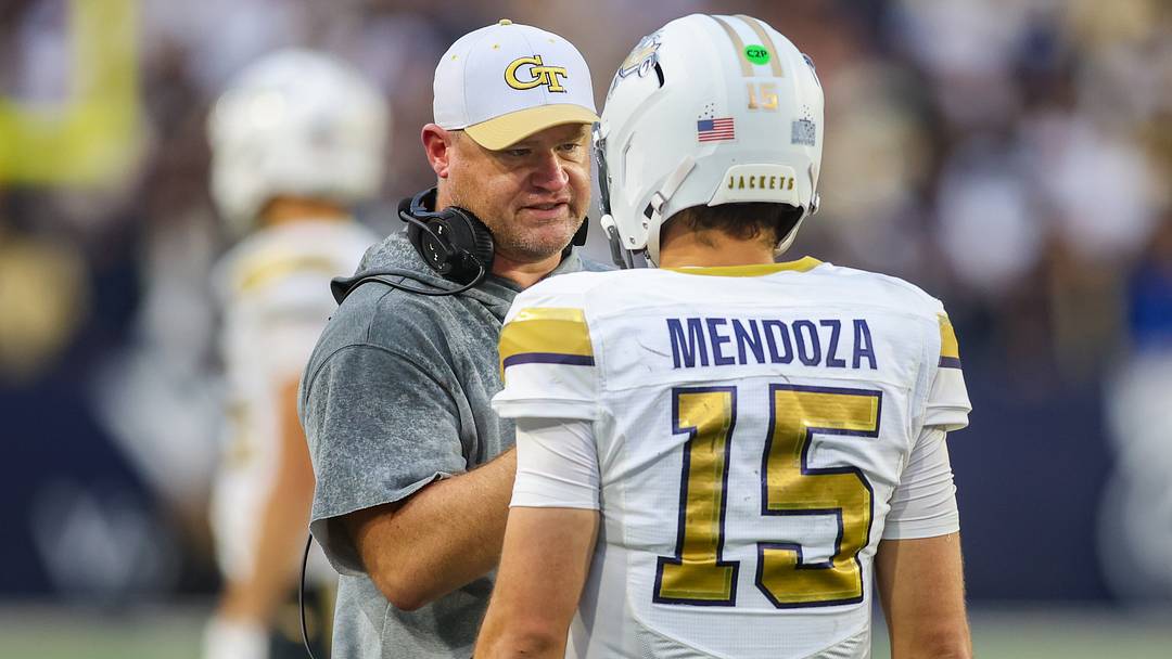 Oct 10, 2026; Atlanta, Georgia, USA; Georgia Tech Yellow Jackets head coach Brent Key talks to quarterback Alberto Mendoza (15) against the Duke Blue Devils in the fourth quarter at Bobby Dodd Stadium at Hyundai Field. Mandatory Credit: Brett Davis-Imagn Images