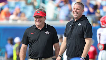 Oct 28, 2023; Jacksonville, Florida, USA; Florida Gators head coach Billy Napier and Georgia Bulldogs head coach Kirby Smart prior to the game at EverBank Stadium. Mandatory Credit: Kim Klement Neitzel-Imagn Images