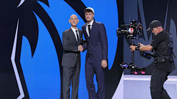 Cooper Flagg poses with NBA commissioner Adam Silver after being drafted first by the Dallas Mavericks in the 2025 NBA Draft