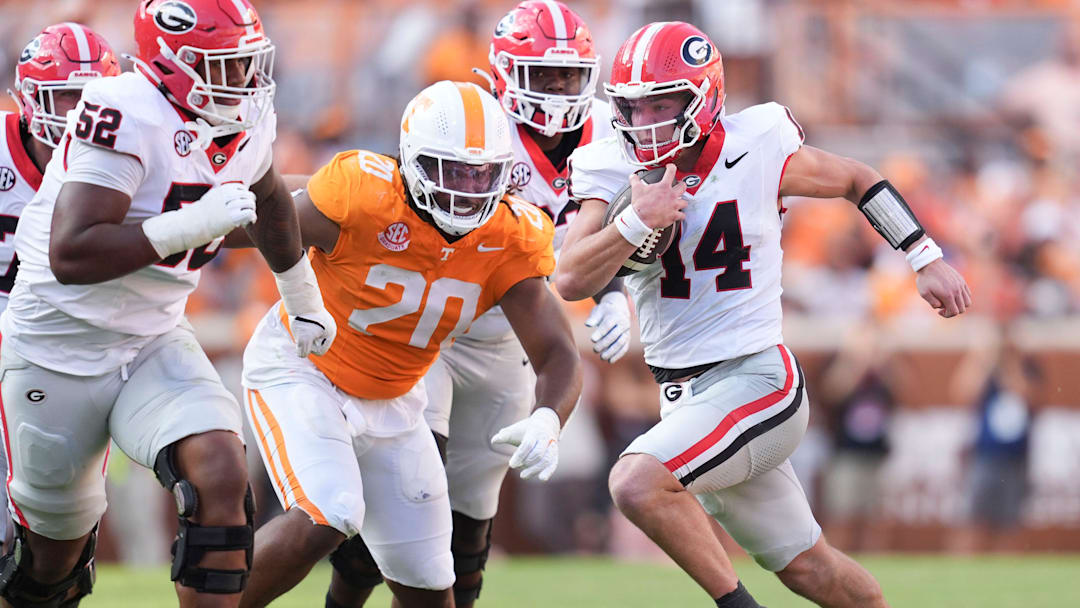 Georgia quarterback Gunner Stockton (14) runs with the ball during an NCAA college football game against Tennessee on September 13, 2025, Knoxville, Tennessee.